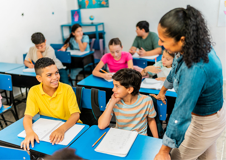 Teacher interacting with students in classroom